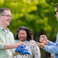 Players play rock paper scissors to start a game